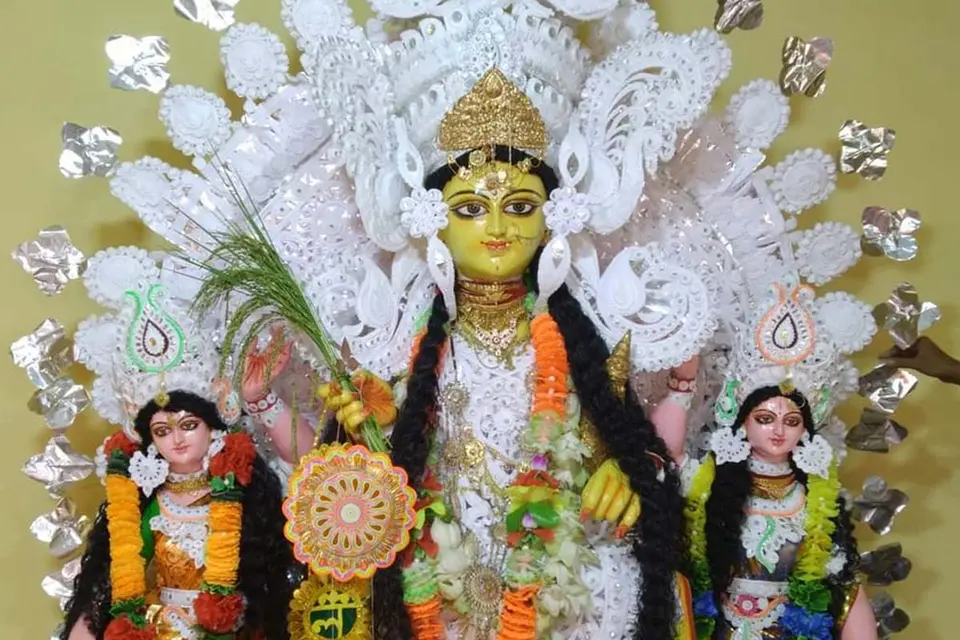 Laxmi puja : Fairies placed in two sides of Laxmi idol in Andal Singha bari